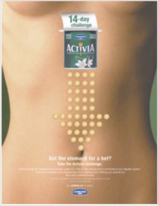 This sexualized image appeared in a Canadian Activia campaign. Like other advertisements, it features a woman’s flat abdomen. It also exposes the lower curve of her breasts.