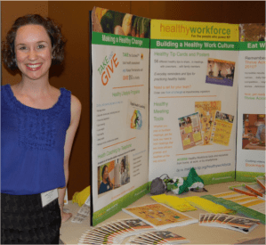 Me, spreading the news about worksite wellness at a table event